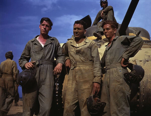 Tank crew standing in front of M-4 tank, Ft. Knox, Ky. 1942. Creator: Alfred T Palmer
