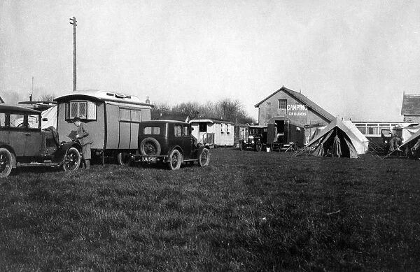 Voyageur caravan with Austin Seven on campsite early 1930 s. Creator: Unknown