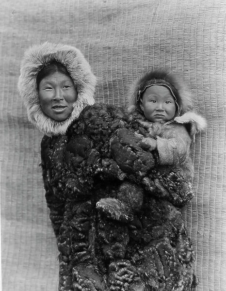 Woman and child, Nunivak, c1929. Creator: Edward Sheriff Curtis