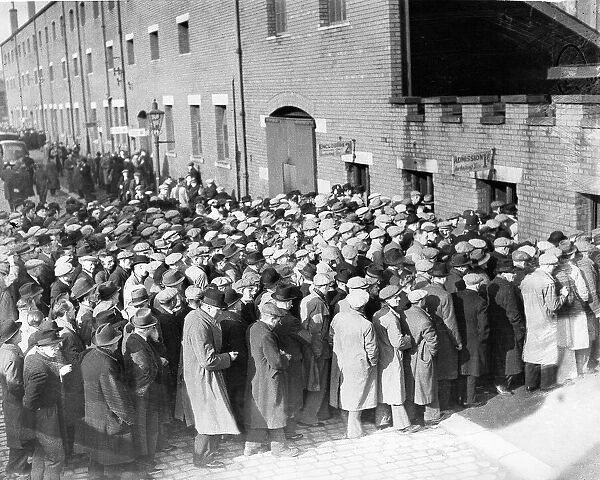 Crowds queue to get into Ewood Park for the F. A. Cup 6th round replay match between Blackburn Rovers and Huddersfield Town