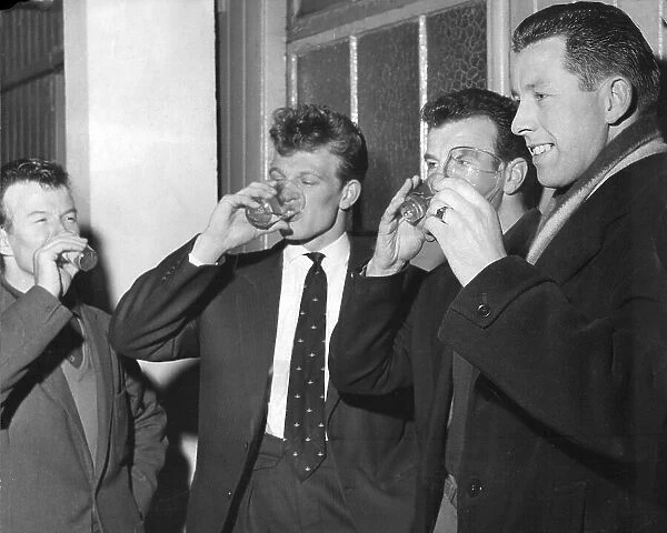 Footballers of Brighton and Hove Albion fc taking anti flu medicine 1961