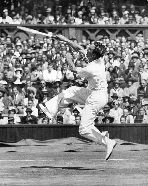 Fred Perry playing at Wimbledon 1934