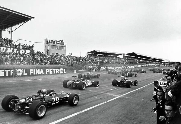 1968 British Grand Prix. Brands Hatch, Great Britain. 20 July 1968. Jean-Pierre Beltoise, #18 Matra MS11, retired, and Piers Courage, #20 BRM P126, 8th position, for the field at the start