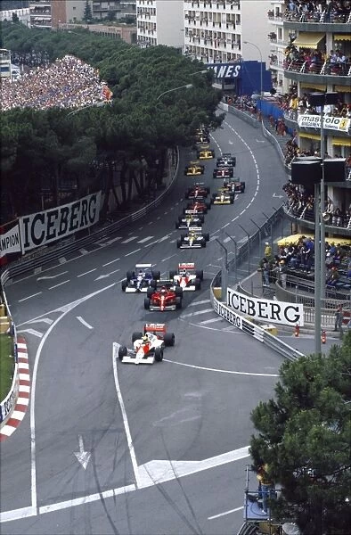 1990 Monaco Grand Prix: Ayrton Senna leads into Ste. Devote followed by Alain Prost, Jean Alesi, Gerhard Berger, Riccardo Patrese, Pierluigi Martini