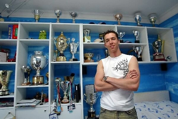 Clivio Piccione at Home: Clivio Piccione with his many racing trophies in Monte-Carlo