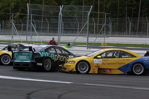 DTM Championship 2002, Round 10 - Hockenheimring, Germany, 6 October 2002 - Manuel Reuter (Opel Team Phoenix) was forced to retire early when he was unable to avoid a collision with fellow Opel driver Michael Bartels (Opel Team Holzer)