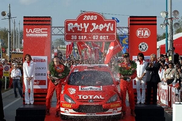 FIA World Rally Championship: Marcus Gronholm, Peugeot 307 WRC, celebrates his win on the podium