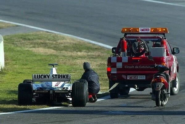 Formula One Testing: Anthony Davidson BAR Honda 003 about to be towed back to the pits after his car failed