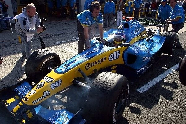 Formula One Testing: Jacques Villeneuve Renault R24 stops in the pitlane with gearbox troubles