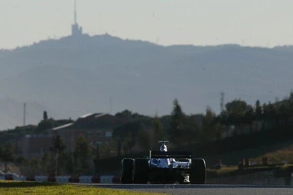 Formula One Testing: Testing continues into the setting sun