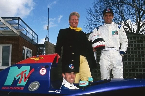 Formula One World Championship: David Brabham with team mate Roland Ratzenberger stand with Barbara Behlau, a sports manager based in Monaco