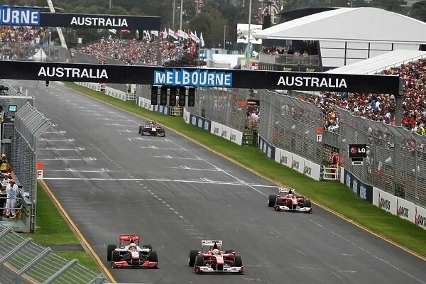 Formula One World Championship: Felipe Massa Ferrari F10 and Lewis Hamilton McLaren MP4  /  25 battle for position