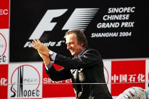 Formula One World Championship: Ferrari President Luca di Montezemolo celebrates on the podium