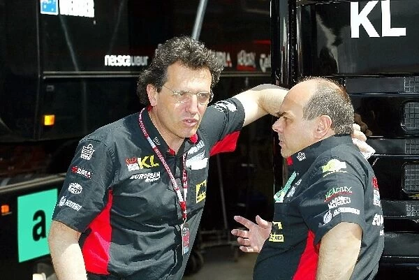 Formula One World Championship: Gabriele Tredozi Minardi Technical Director and Mark Parish Minardi Engine Liason Manager