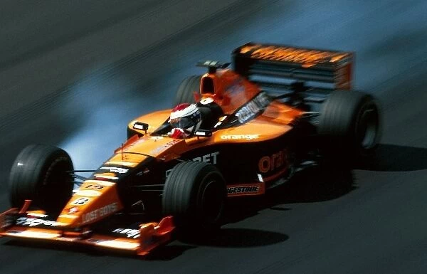 Formula One World Championship: Jos Verstappen Arrows Supertec A21 locks up a wheel. He finished the race in 7th place