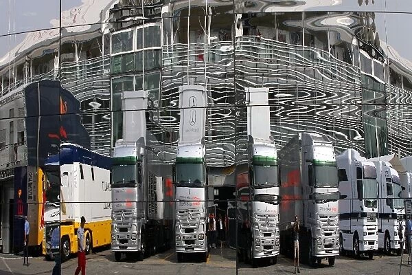 Formula One World Championship: McLaren trucks reflected in the McLaren brand centre