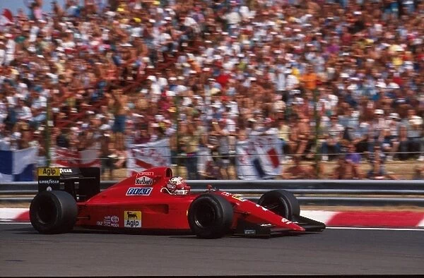 Formula One World Championship: Nigel Mansell, Ferrari 641, retired but classified 17th