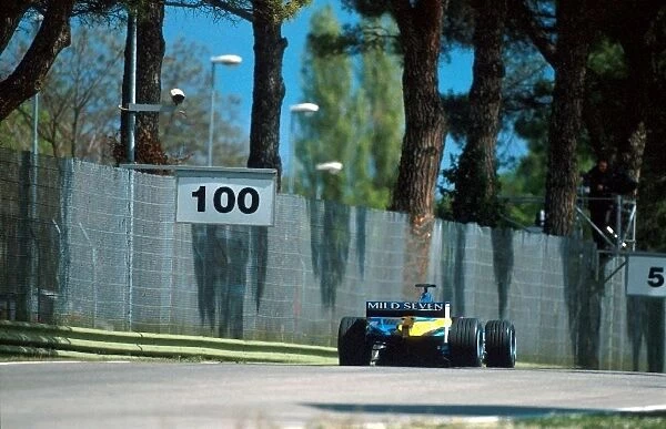 Formula One World Championship: A Renault R202 heads toward the Variante Alta
