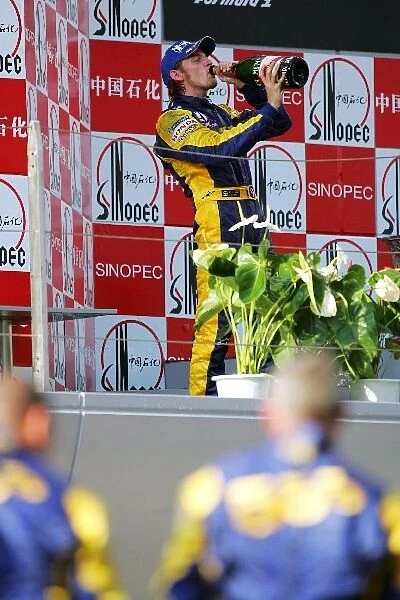 Formula One World Championship: Second place Jenson Button BAR celebrates on the podium