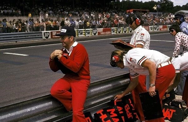 Formula One World Championship: Teddy Mayer McLaren Team Owner watches from the pit wall as his drivers Denny Hulme and Emerson Fittipaldi finish sixth