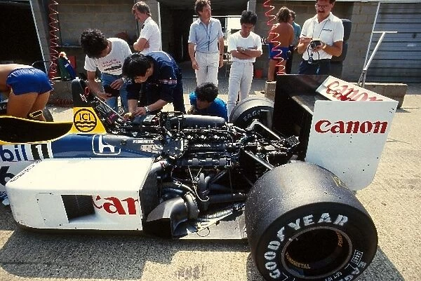 Formula One World Championship: The Williams Honda mechanics work on Nelson Piquets car