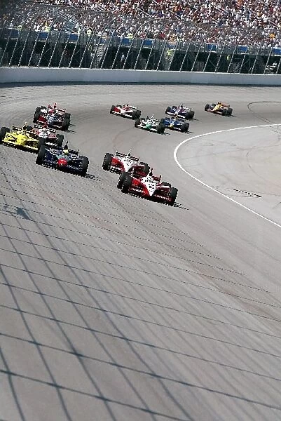 Indy Racing League: Fouth placed Tomas Scheckter Target Chip Ganassi Racing G-Force Toyota leads the field through turn one