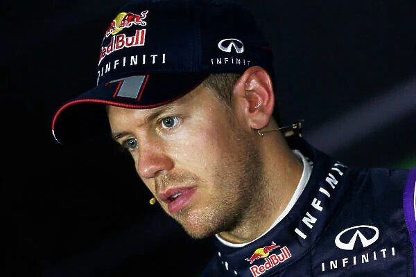 Marina Bay Circuit, Singapore. Saturday 21st September 2013. Sebastian Vettel, Red Bull Racing, in the press conference after qualifying. World Copyright: Charles Coates / LAT Photographic. ref: Digital Image _N7T5374