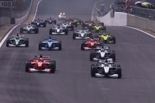 Mika Hakkinen leads at the start: 2000 Brazilian Grand Prix. Race