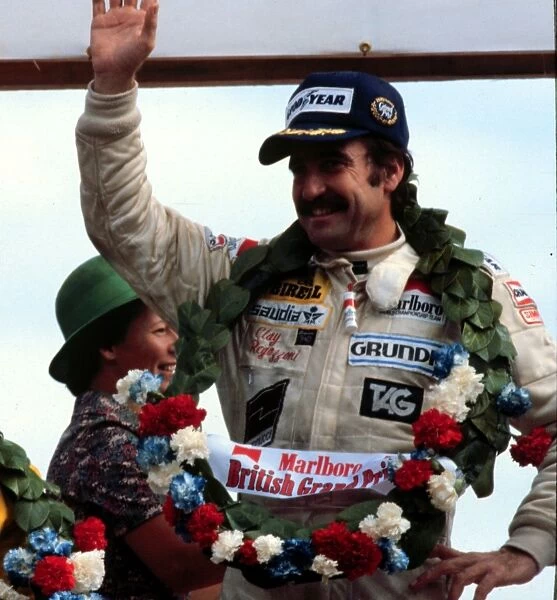 REGAZZONI WINS BRITISH GP 1979 FOR WILLIAMS: Clay Regazzoni, 1st position on the podium
