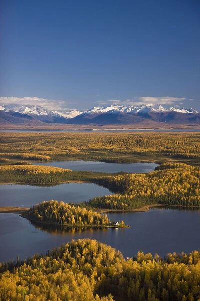 Aerial View Of The Lakes And Birch Forests At Point Mackenzie On The Opposite Side Of Knik Arm From Anchorage With The Chugach Mountains In The Background, Southcentral Alaska