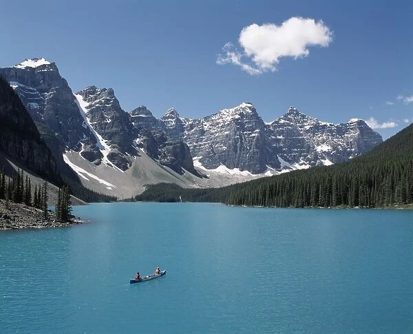 Canoeing On Moraine Lake, Banff National Park; Alberta, Canada