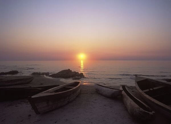 Canoes And Fishing Boats On Beach By Lake Malawi, Sunset