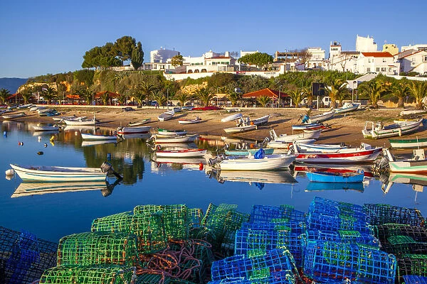 Colorful fishing traps and motorboats along the beach, Elvas, Alentejo Region, Portugal