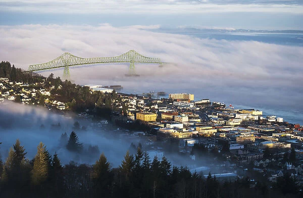 Fog Hovers Over The Columbia River; Astoria, Oregon, United States Of America