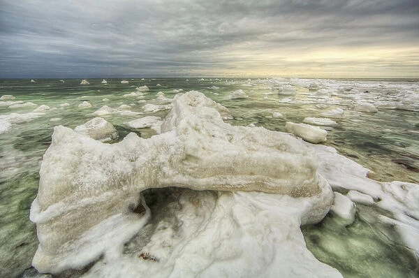 The green ice filled water of hudsons bay; Manitoba canada