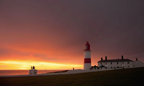 A Lighthouse On The Coast At Sunset; Whitburn, Tyne And Wear, England