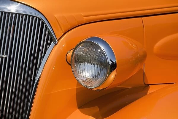Orange Painted Vintage Cars Headlight And Front Grill; Port Colborne, Ontario, Canada
