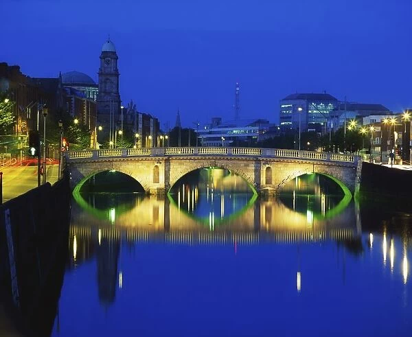 Queens Street Bridge, River Liffey, Dublin, Ireland; Bridge Over River At Night