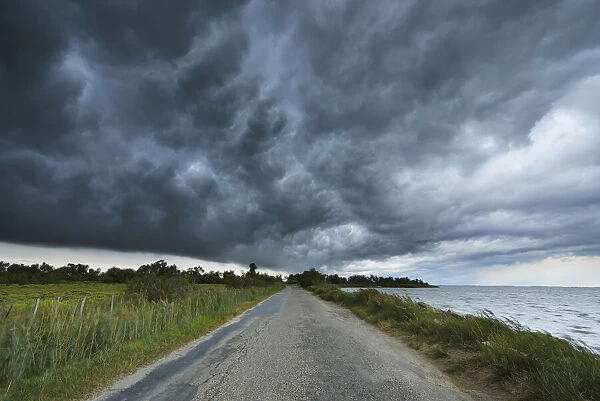 Thunder Storm over Country Road, Etang de Vaccares, Camargue, Bouches-du-Rhone, Provence-Alpes-Cote d Azur, France