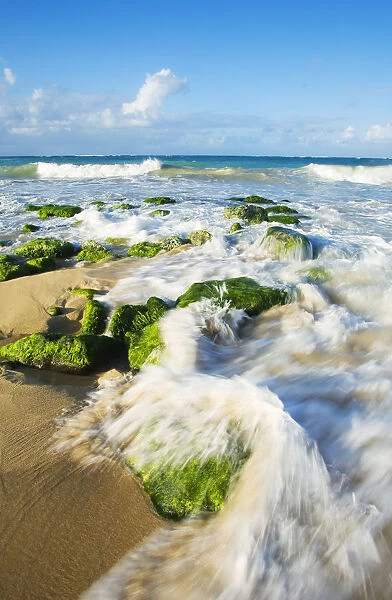 USA, Hawaii Islands, Maui, Surf washing over rocks; Baldwin Beach