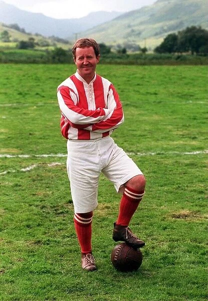 Actor Jonathan Watson August 1998 in old fashioned football kit during filming of The