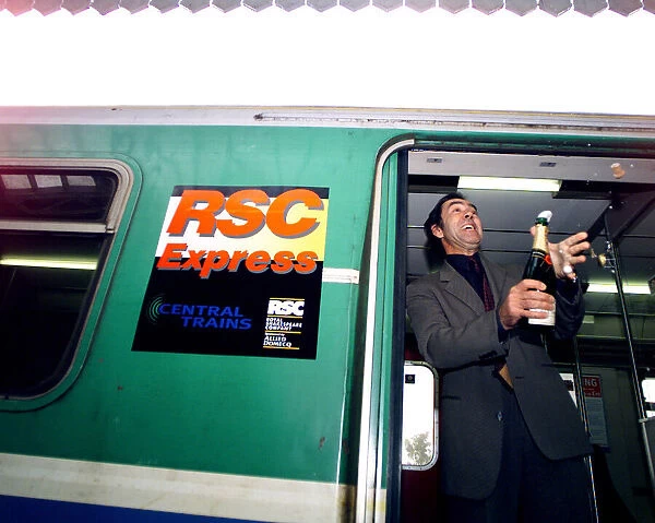 Actor Robert Lindsay toasts the new RSC Express at Stratford station