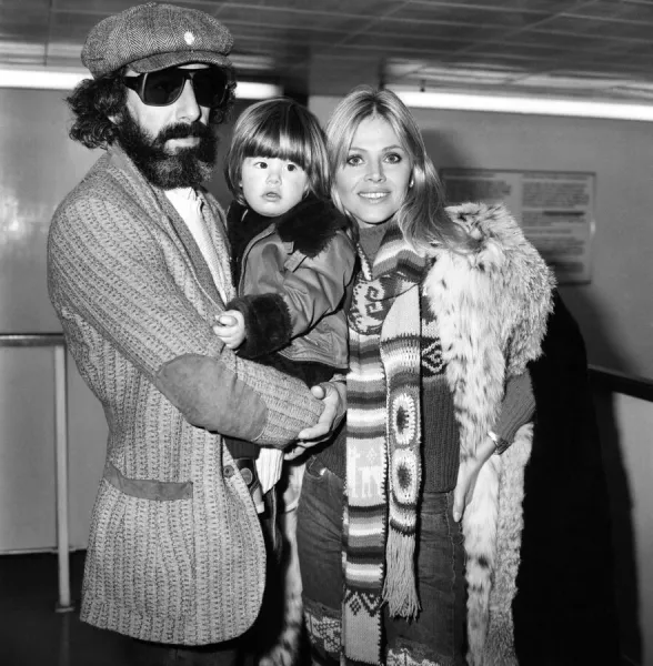 Actress Britt Ekland with son Nicoli and boyfriend Lou Adler. December 1974 74-7577