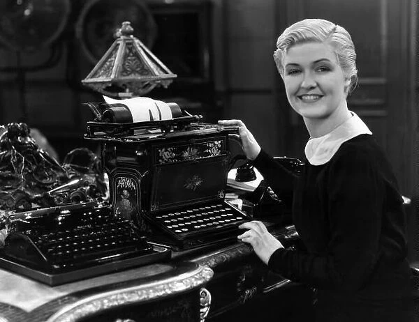 Actress Laura La Plante at a typewriter. 12th March 1934