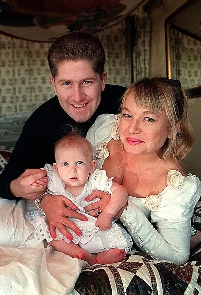 Actress Nicola Duffett with husband Ian Henderson 1995 and baby at home