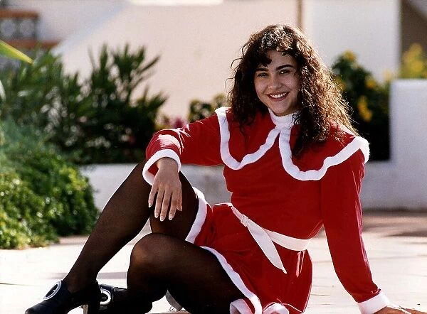 Actress Sandra Sandri by the pool wearing Santa outfit on the set of filming Eldorado for