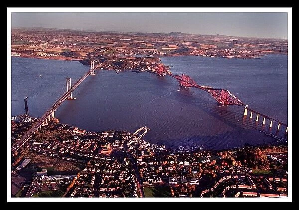 Aerial view of Edinburgh showing Forth rail road bridge November 1998