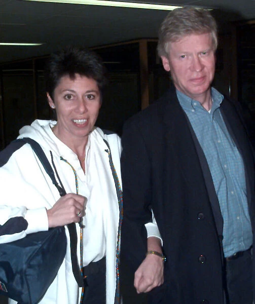 Aid worker Sally Becker arrives at Heathrow in Dec 1998, with her husband, Duncan Stewart