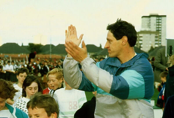 Alan Wells Scottish athlete clapping hanmds February 1990
