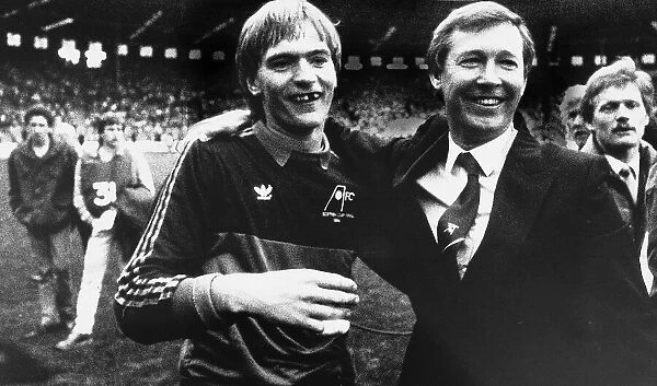 Alex Ferguson Manager of Aberdeen celebrates with goalkeeper Jim Leighton after winning